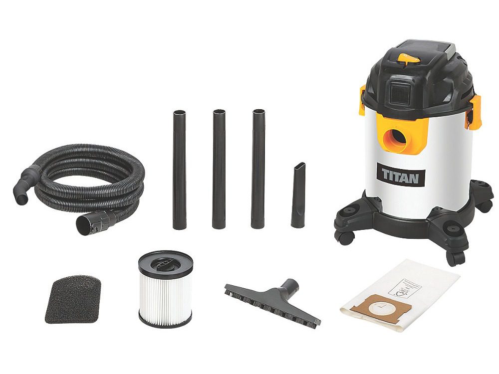 Image of a Titan wet/dry vacuum cleaner and its accessories. The set includes a vacuum canister with wheels, a flexible hose, three extension wands, a crevice tool, a floor nozzle, a foam and a cartridge filter, and a dust bag.