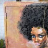 A Tallboy hand-painted cabinet featuring a portrait of a woman with a large afro hairstyle. The artwork adorning the door of this upcycled linen cupboard beautifully illustrates her eyes, nose, and lips in vibrant detail. A small ceramic vase graces the top of the cabinet, and a plant is visible to the left. This versatile piece can be used as bedroom storage, kitchen storage, or clothes storage.