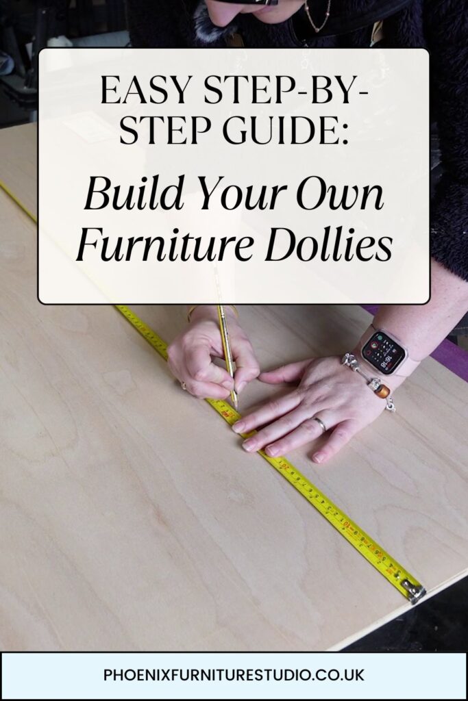 A person measures a large wooden board with a tape measure and pencil. Text overlay reads: "Easy Step-By-Step Guide: Build Your Own Furniture Dollies." The bottom of the image shows the website "PhoenixFurnitureStudio.co.uk". The person wears a black watch and bracelet.