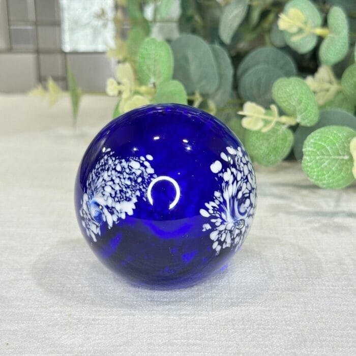 Cobalt Blue Glass Paperweight with White Feather Design - Image 2