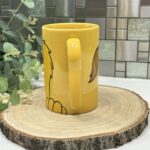 Disney's The Lion King Mug - Vintage Yellow, Simba Mane & Paws Design